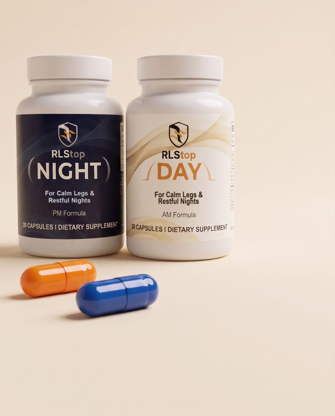 One orange DAY capsule and one blue NIGHT capsule in front of the two RLStop bottles